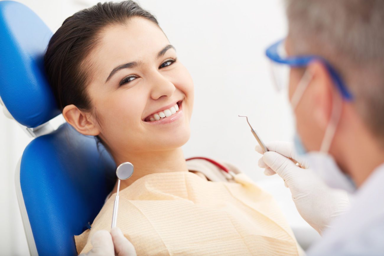 Happy patient after a tooth extraction apex dental northborough ma
